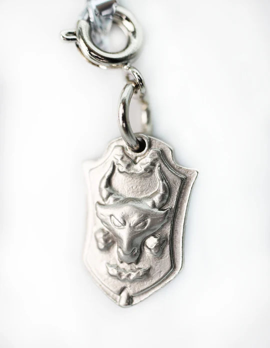 Traveler's Trinkets Tower Shield Charm