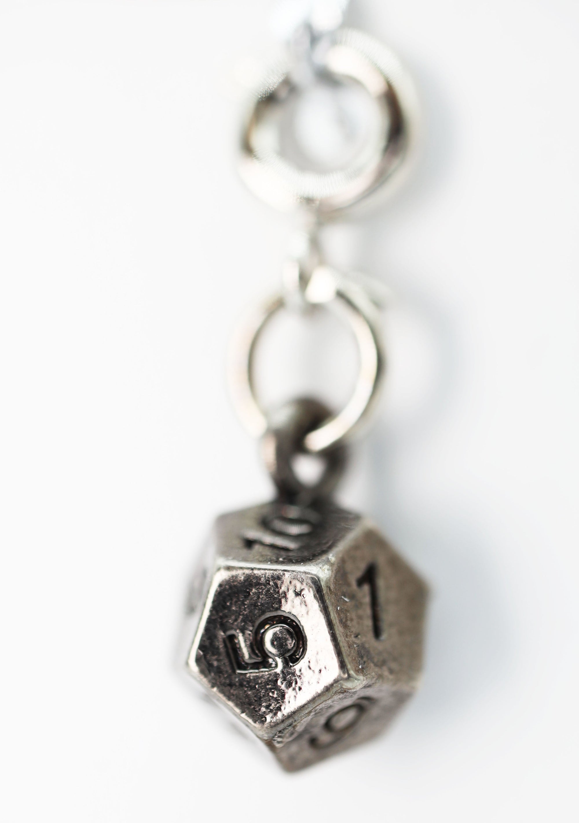 Traveler's Trinkets D12 Charm